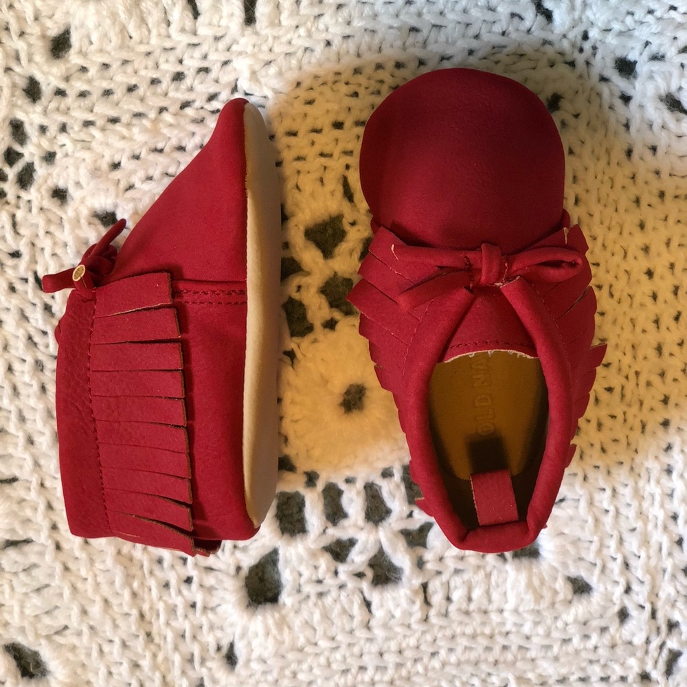 Red infant baby shoes